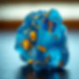 Stunning blue crystal with shimmering gold flecks reflecting light