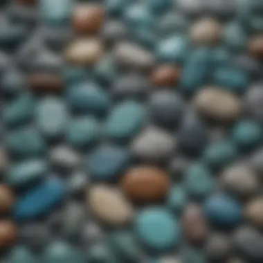 A variety of aqua colored stones arranged aesthetically, highlighting their differences in shades and textures.