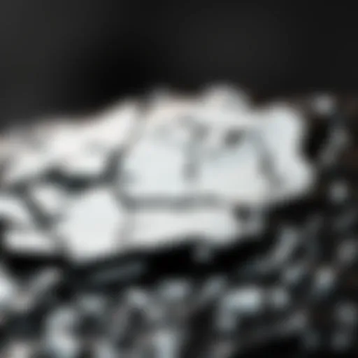 The Glossy Allure of Black Obsidian Close-up view of black obsidian showcasing its glossy texture and sharp edges