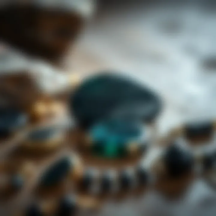 An artistic arrangement of obsidian jewelry pieces highlighting their elegance