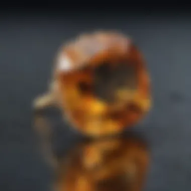 Close-up view of cut citrine gemstone in jewelry setting