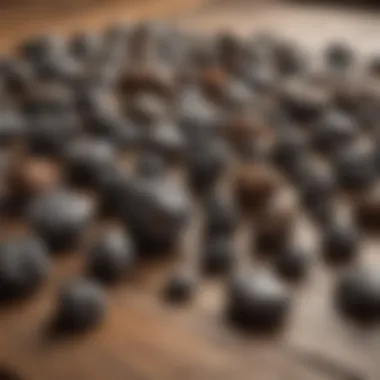 Diverse Collection of Iron Meteorites A collection of various iron meteorites displayed on a rustic wooden table.