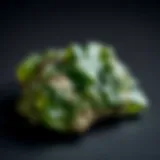Natural moldavite pieces showcasing their unique green hues and textures
