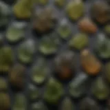 Diverse moldavite specimens showcasing unique shapes and colors