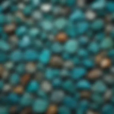 A collection of various turquoise stones, displaying a spectrum of colors from green to blue, highlighting natural variations.