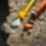 Close-up of a stone surface with various adhesives applied
