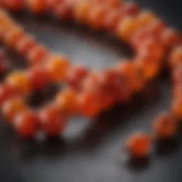 A close-up view of vibrant carnelian mala beads showcasing their natural patterns and colors